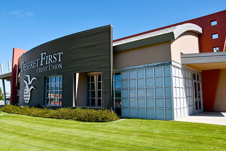 exterior photo of the Logan branch, with the Deseret First Credit Union logo visible