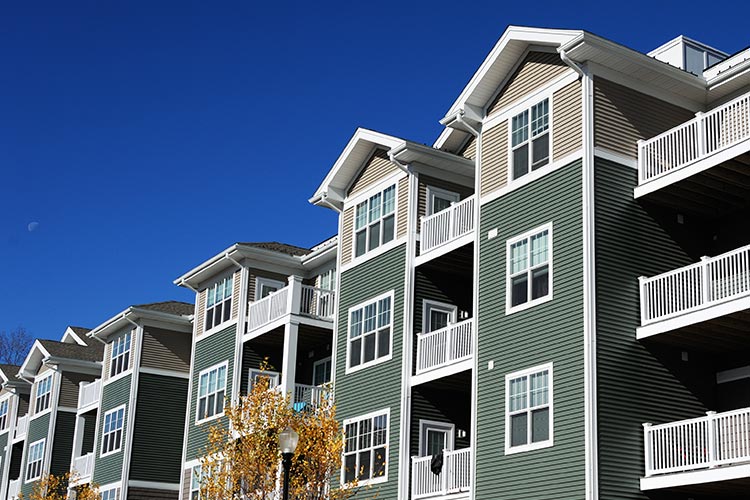 exterior photo of a 4 story apartment building